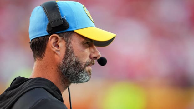 Chargers head coach Brandon Staley looks on while coaching in a game.